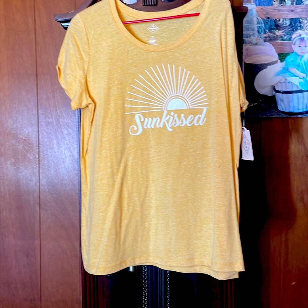 Brand new top with tags.